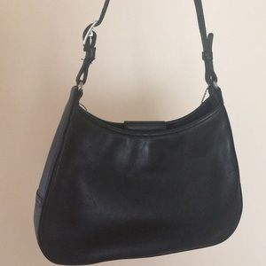 Authentic Coach Mini bag with strap.